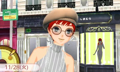 a screenshot from a video game shows a female character with short red hair, wearing a beret, round glasses, and a striped top. she's standing on a city street in front of a store, with a bus stop visible in the background.  the image has soft lighting, creating a cheerful and approachable feel.