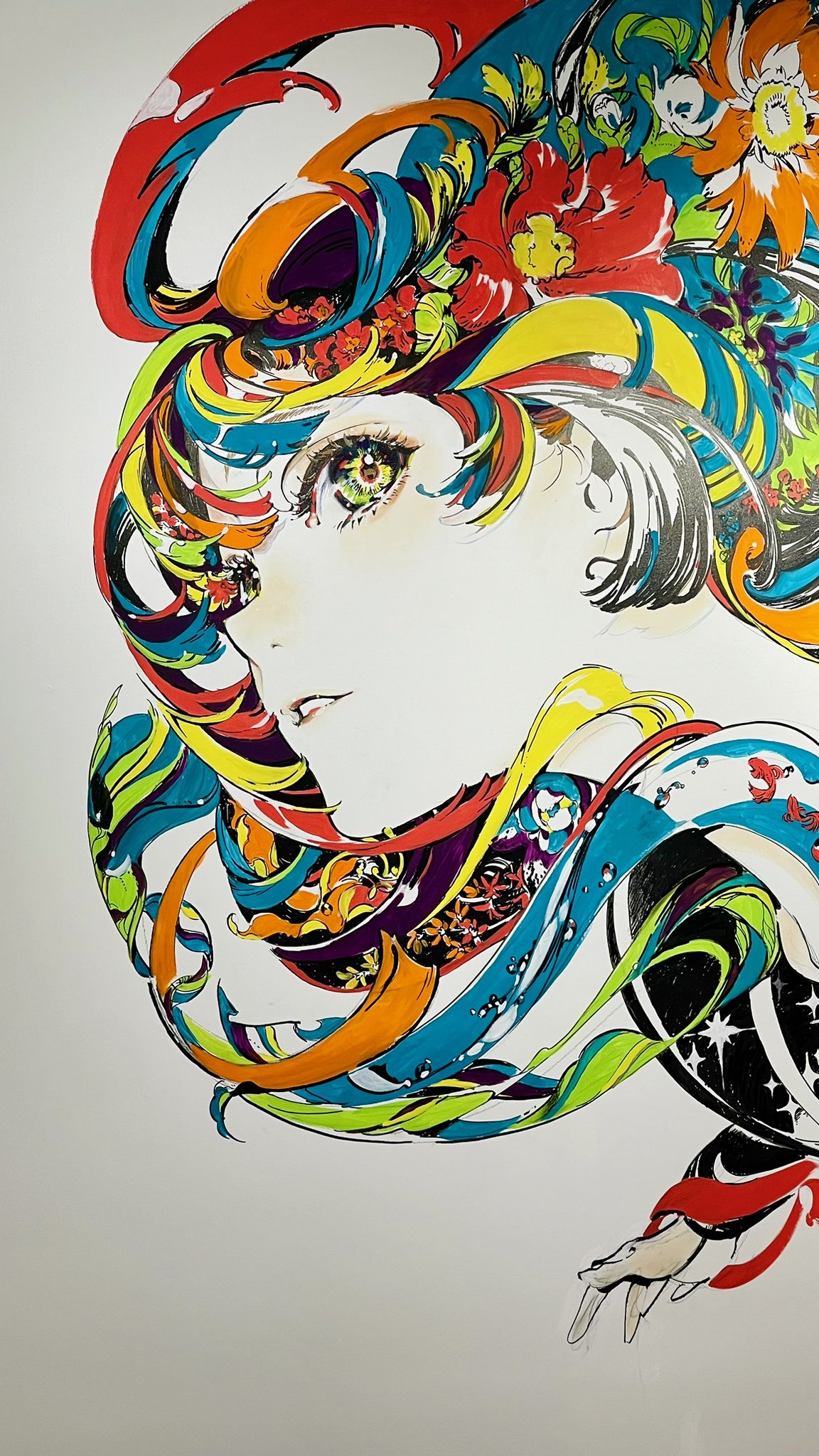 the image is a stylized portrait of a woman drawn in a dynamic, abstract anime or manga style. she is shown in profile, facing left, with her eye as the main focal point. her hair flows into an elaborate design of swirling lines, floral elements, and vibrant colors. the background is a plain white, putting all the focus on the colorful and energetic subject.