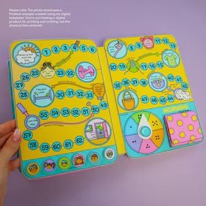 an open board game with different learning concepts is shown in the image. the board game teaches counting and numbers in a playful way.