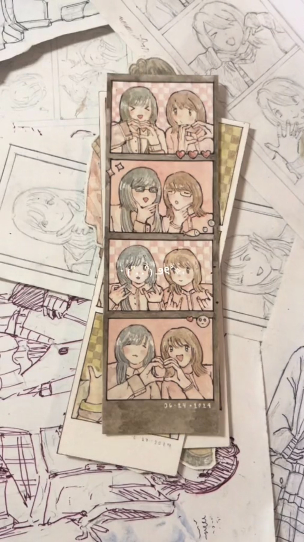 this image is a drawing of a scrapbook page. it features a polaroid photo booth strip with photos of four girls.  all the girls are smiling and posing for the photos. the scrapbook page is also filled with handdrawn doodles, and sketches.