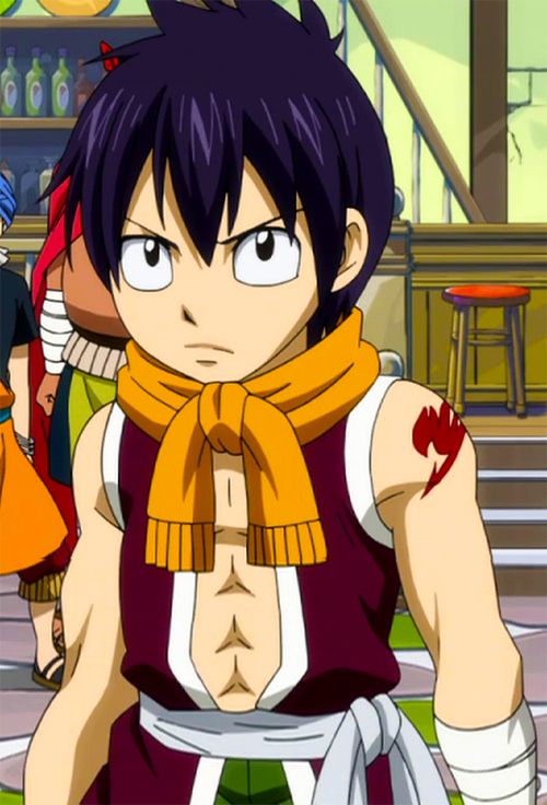 a young anime character, male, is standing and looking directly at the viewer with a serious expression. he has purple hair, an orange scarf, a red mark on his arm, a shirt and pants with a white belt. he's looking directly at the viewer and his expression is serious. he appears to be a teenager.  this appears to be a scene from the anime fairy tail.