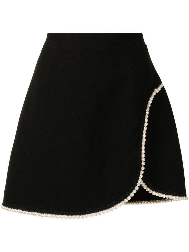 a black mini skirt with an asymmetric hemline and a pearl trim. the skirt is high waisted and sits above the knees. it is a contemporary style that would be perfect for a night out or a special occasion.