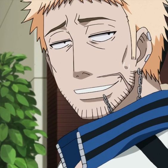 this is a closeup illustration of a male anime character. he has short, spiky blonde hair, stubble, a scar on his right cheek, and is wearing two earrings in his left ear.  he has a confident smirk on his face. he's wearing a white and blue tracksuit and a silver chain around his neck. the background is out of focus and suggests a daytime outdoor setting with greenery.  the overall lighting is soft.