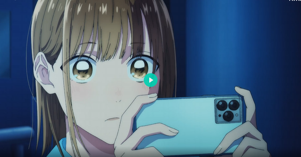 loseup view of an animestyle girl with brown hair, large expressive eyes, and a slightly sad or thoughtful expression. she's holding a smartphone with a triplelens camera close to her face, partially obscuring her lower features. the background is a blurry, dark blue, suggesting a nighttime setting. the overall style is reminiscent of contemporary anime aesthetics, with soft lighting and detailed character design.  a play button is visible in the image, indicating this might be a still from a video.