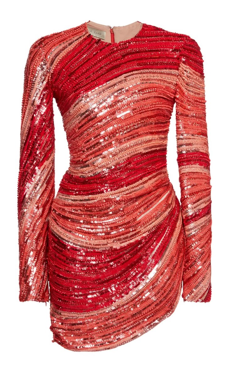 a longsleeved cocktail dress featuring red and coraltoned sequins. the dress has a fitted silhouette and a draped effect at the skirt hem.
