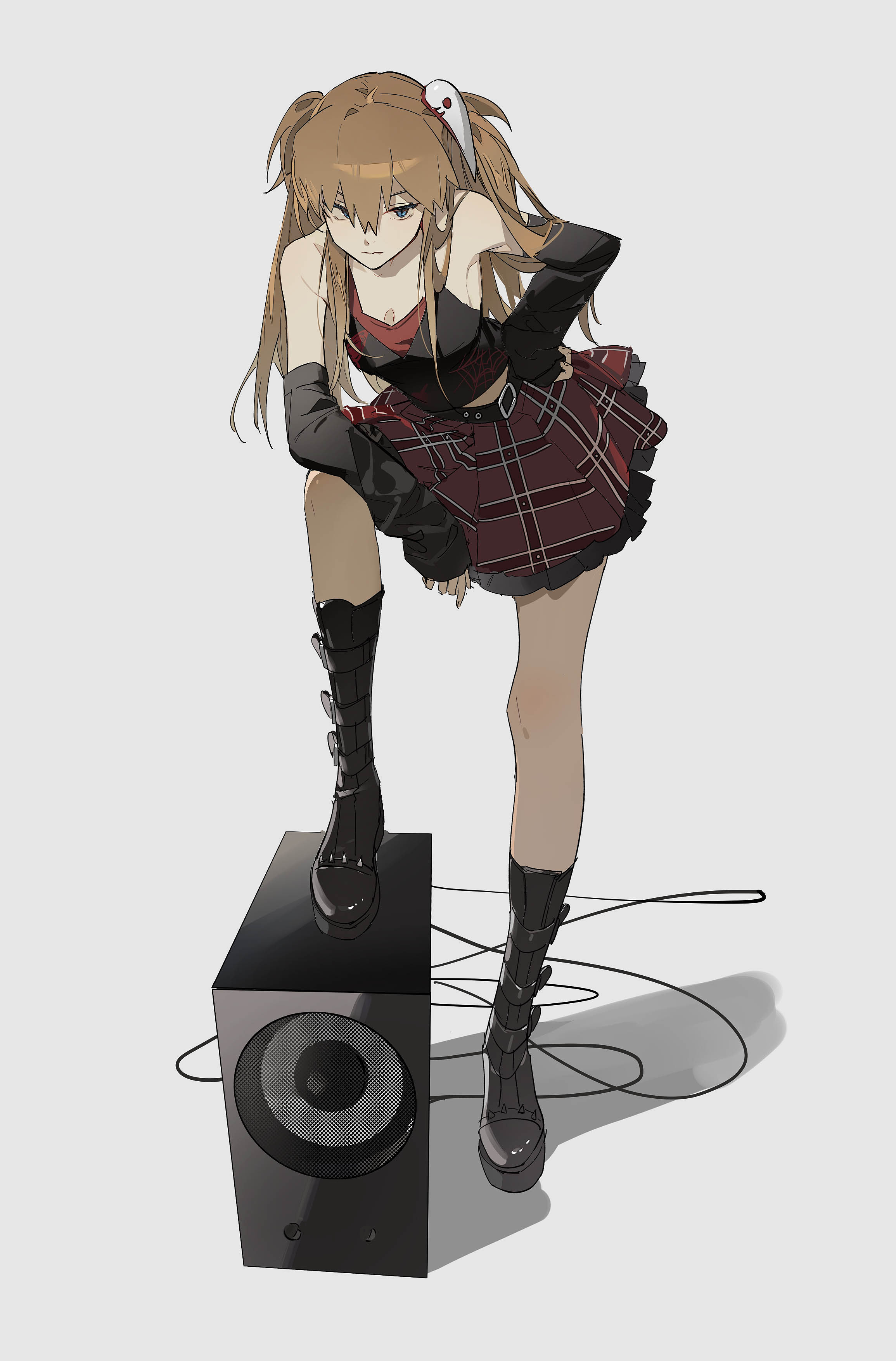 the image shows an animestyle illustration of a girl with long brown hair styled in a ponytail, wearing a sleeveless black top, a red and black plaid skirt, and black boots.  she's wearing black arm warmers or gloves that extend to her elbows. she is standing on a large black speaker, and the overall style is a blend of casual and slightly edgy. the background is a plain, light gray. the art style is digital and has a somewhat painterly quality.