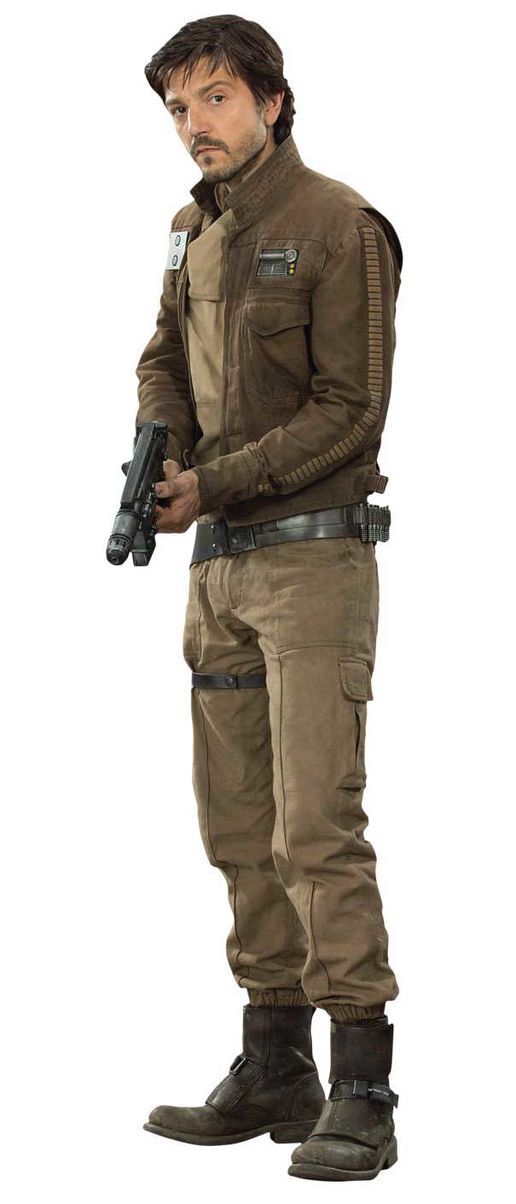 a man in a brown jacket and pants is holding a blaster. he is standing in front of a white background and looking serious. he appears to be a soldier from the star wars universe.  the character is cassian andor from rogue one.