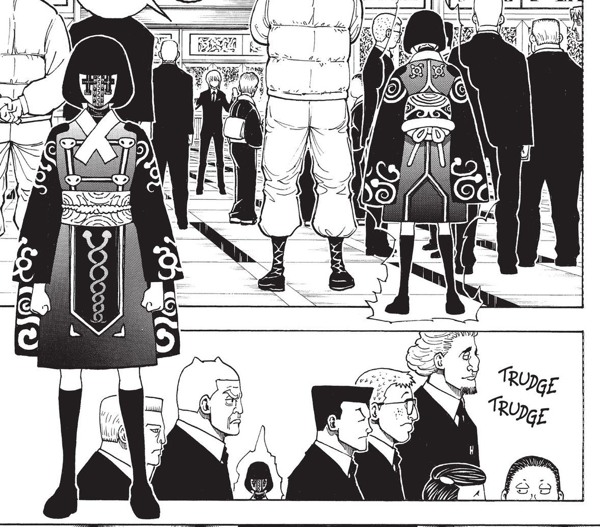 a black and white manga panel depicting a crowd of people inside a building. the focus is on a young woman in the foreground wearing a distinctive black and white robe with intricate patterns. the crowd behind her is a mix of people in traditional and modern clothing, suggesting a blend of cultures or time periods. the setting appears to be a temple or ceremonial hall, indicated by the tiled floor and the formal attire of some attendees. the word "trudge" is repeated twice in the background, hinting at the mood or movement of the crowd.