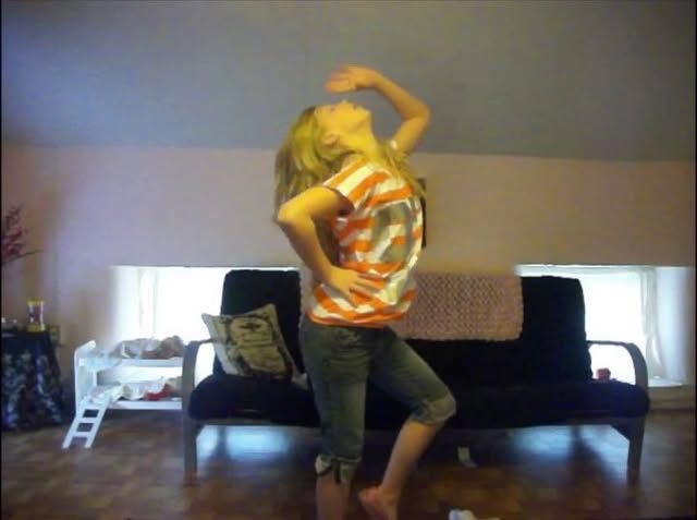a young girl is posing