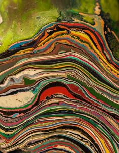 an abstract painting of colorful lines and swirls. the painting is layered and textured, creating a psychedelic effect. the colors are bold and vibrant, and the overall effect is trippy and artistic.