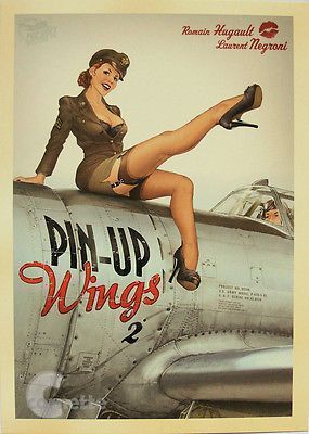 a pinup girl in a military uniform is standing on the wing of a wwii p51 mustang fighter plane, holding onto the aircraft with one hand. the pinup girl is wearing a very short uniform dress with high heeled shoes. the woman is looking towards the viewer and smiling with a confident pose. she is wearing lipstick and looking very sexy. the airplane has a "pinup wings" inscription printed on the side.  the artwork has a vintage and retro feel.