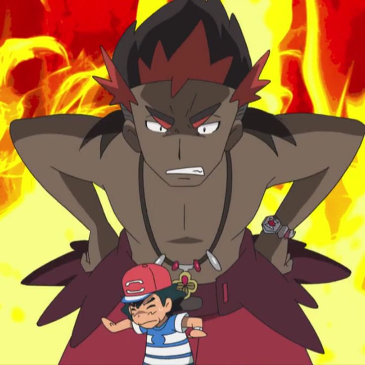 the image shows a scene from the pokemon anime. a male pokemon trainer, with red hair and black eyes, is shown in a closeup full body shot standing with his arms crossed. he looks very angry and determined, with a firelike background behind him. this is a clash between two trainers during a pokemon battle. there is a smaller trainer in the foreground who is visible in the background of the larger trainer. the smaller trainer is wearing a blue and white striped shirt and a red hat. he is also shown with a stern expression. the overall scene is intense and powerful, emphasizing the competitive nature of pokemon battles.