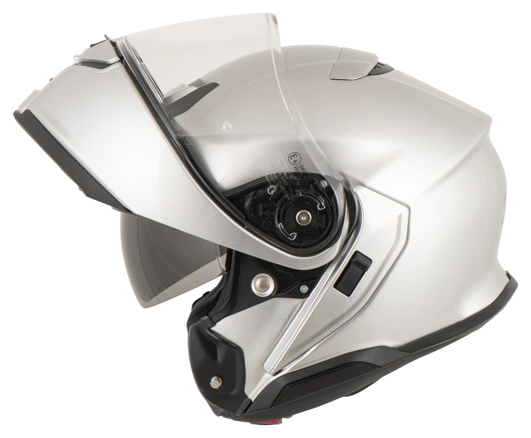 a silver motorcycle helmet with a flipup visor is shown in a side view, isolated on a white background. the helmet is designed for both street and offroad riding, with a sleek, modern design and a visor that can be flipped up for easy communication or ventilation. the helmet also features a chin guard for added protection.  the helmet is a modular style with a large clear visor and a black trim around the edges. the helmet appears to be new and unused.