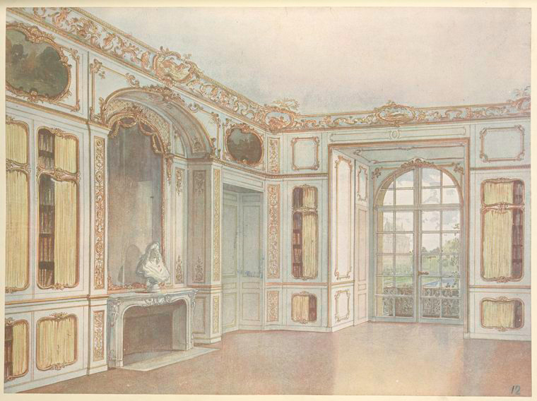 the image shows a rococo style interior with white and gold ornate decorations. there is a fireplace with a bust on top, bookcases, a doorway leading to another room, and a large window looking out onto a garden. the room is empty.
