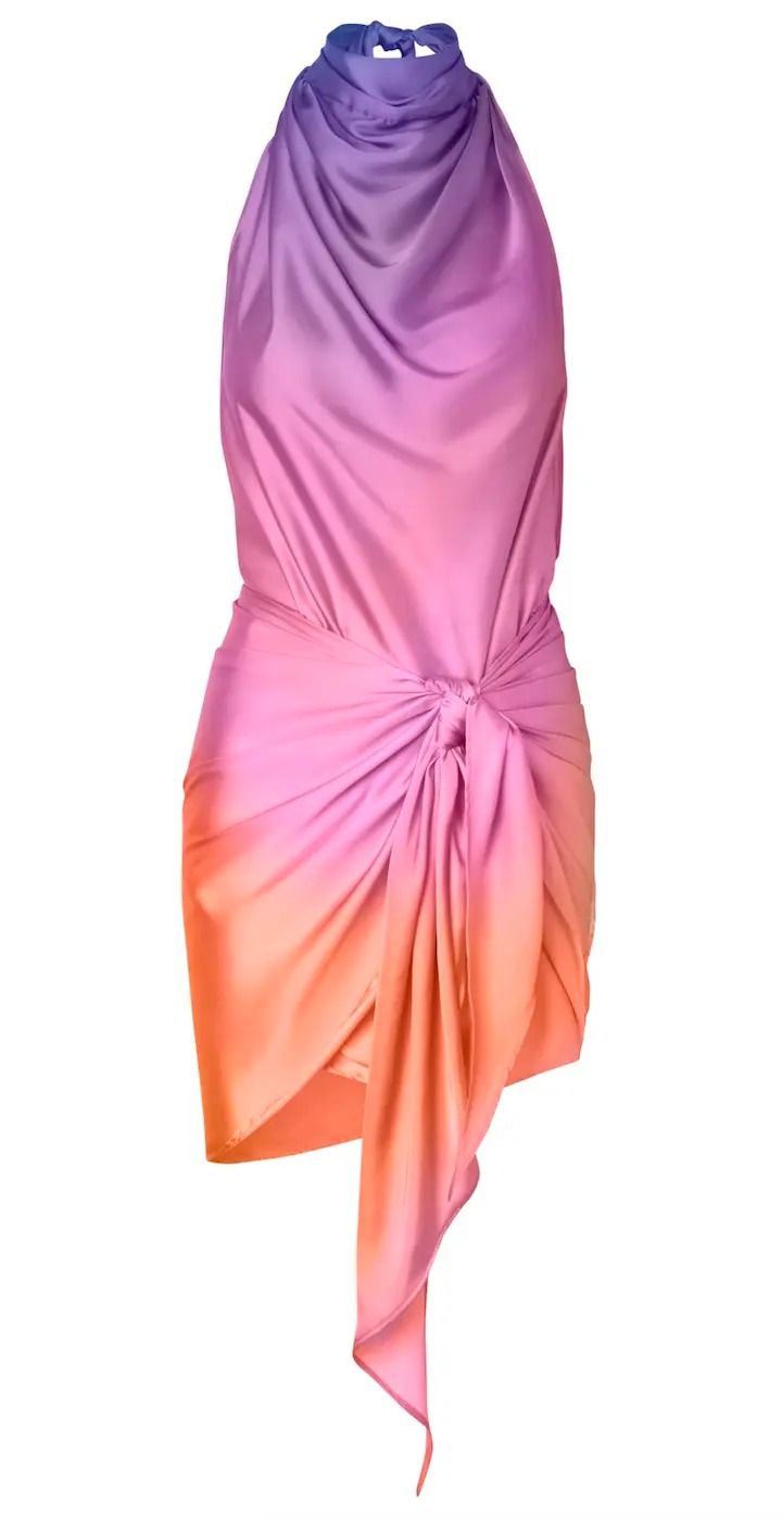 a sleeveless, abovetheknee dress in an ombre pattern of purple, pink, and orange. the dress has a halter neck and a tie at the waist, forming a knot.