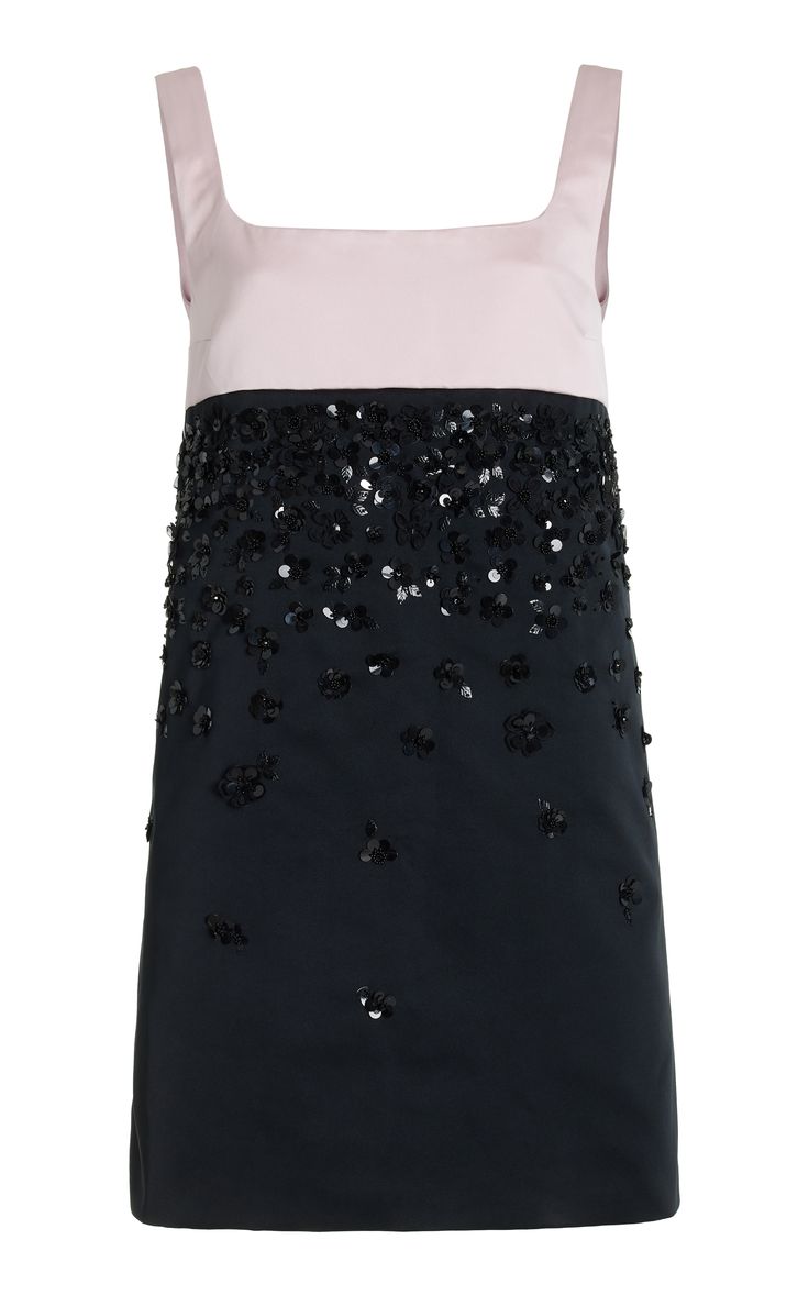 a black sleeveless dress with a pink trim and sequin detailing.  the dress has straps and is designed for a formal event.