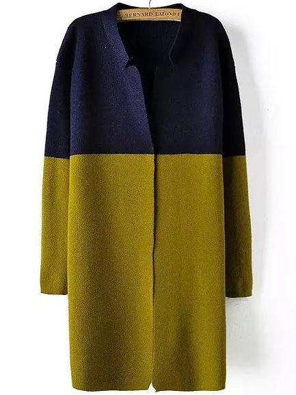 a long, colorblocked coat or cardigan hangs on a hanger. the top portion of the coat is a dark blue or navy color, while the bottom portion is an olive green. the coat has long sleeves and a vneck. it is an open front design.
