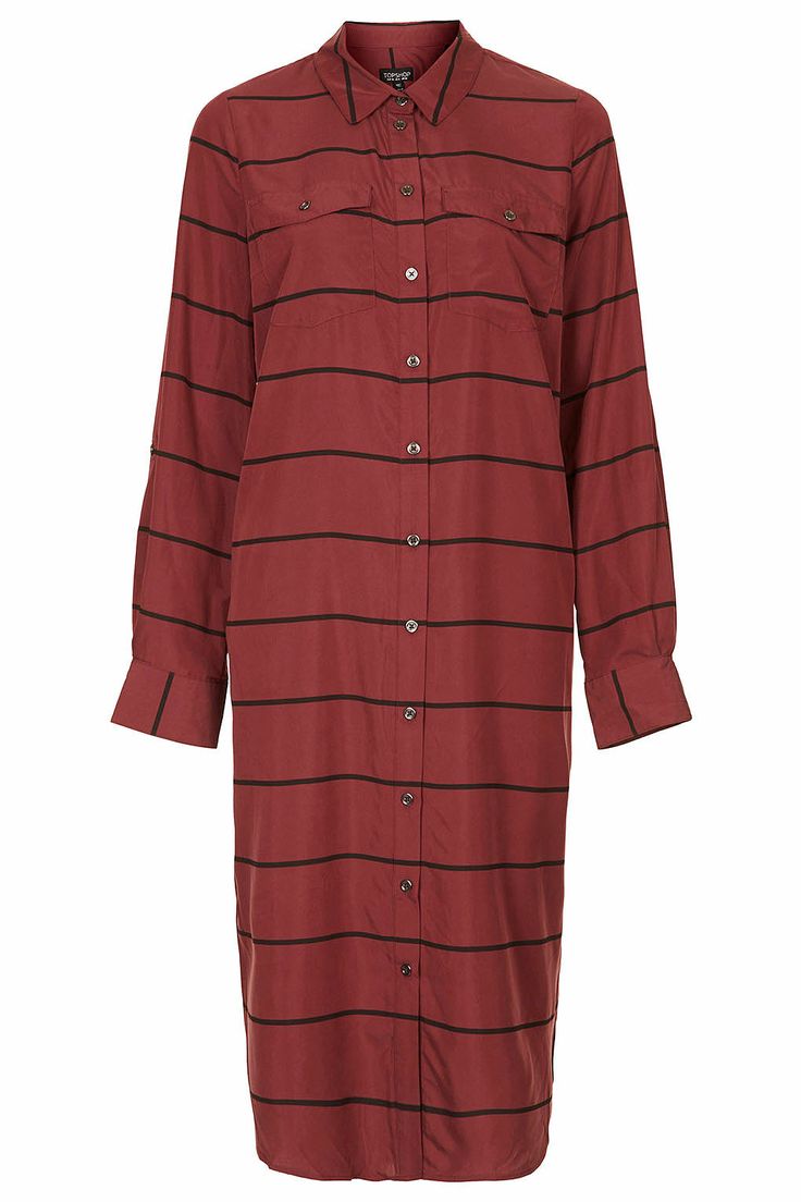 a longsleeved, buttondown shirt dress in brick red with thin black stripes. the dress has a collar, two chest pockets, and runs to about knee length.