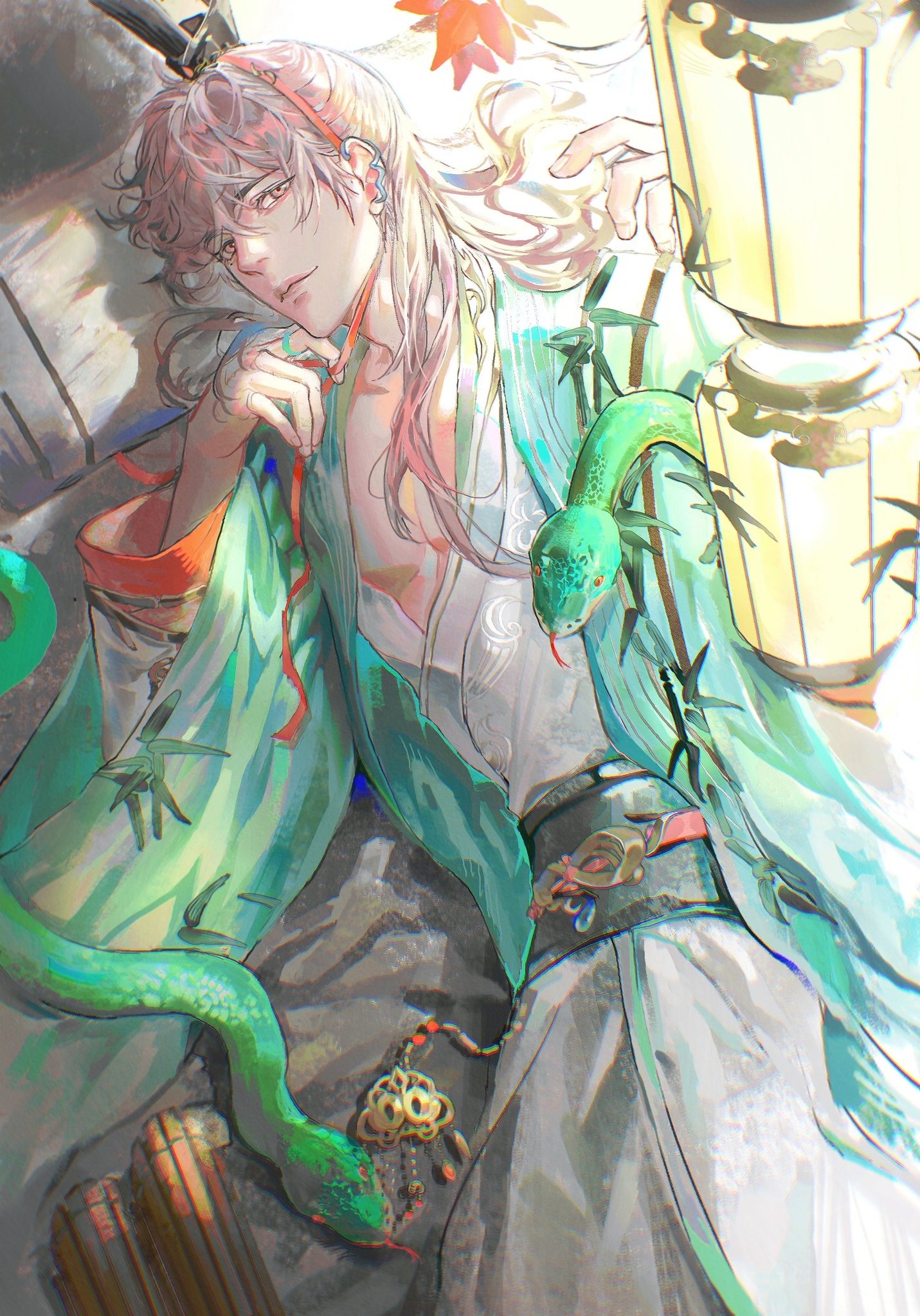 this is an illustration of a young man, wearing a light green and white traditional kimono with a green snake coiled around his arm. he has long pink hair, green eyes, and wears earrings. he's sitting and leaning against a white and wooden pillar. the background is a blurry image of a forest.