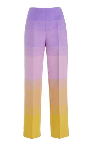 a pair of trousers with a gradient color scheme, fading from lilac at the top to yellow at the bottom.