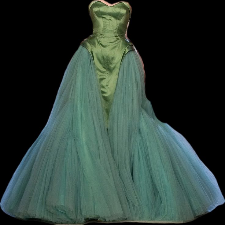 a green strapless ballgown with a satin bodice and layers of tulle skirt.
