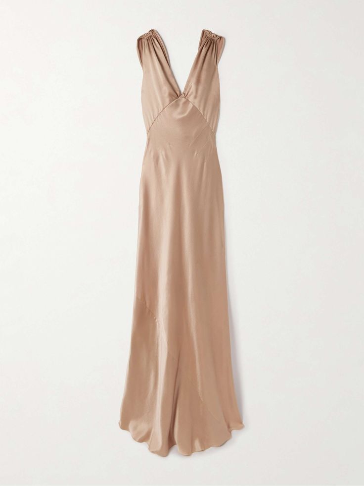 a light brown maxi dress made of silk satin. the dress has a vneck, sleeveless and a slip style. it is an elegant and formal dress, perfect for evening events.