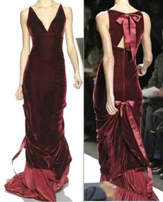 two women wearing the same red velvet evening gown.  the woman on the left is facing forward and the woman on the right is facing away from the camera.  both women are wearing the same red velvet dress with a plunging neckline.  the dress has a very large bow in the back, and it is a long and flowing dress, reaching the floor.