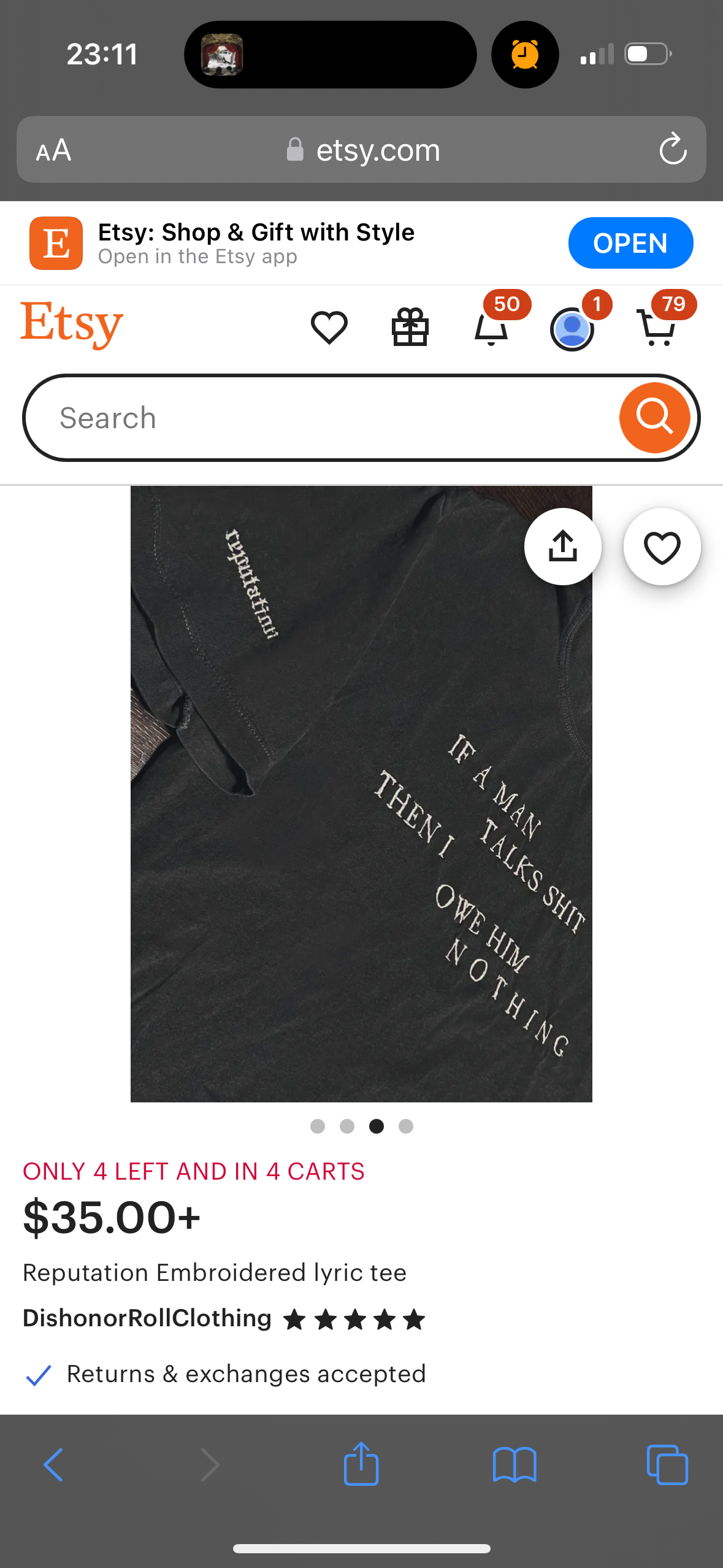 this is a screenshot of an etsy product page. the page is advertising a black tshirt with white embroidered text on it. the text says "if a man talks shit then i owe him nothing" the shirt is being sold by a shop called "dishonorrollclothing" for $35.00. the page also mentions that there are only 4 shirts left in stock and they are in 4 carts, which means that there are a few people who are interested in purchasing them.