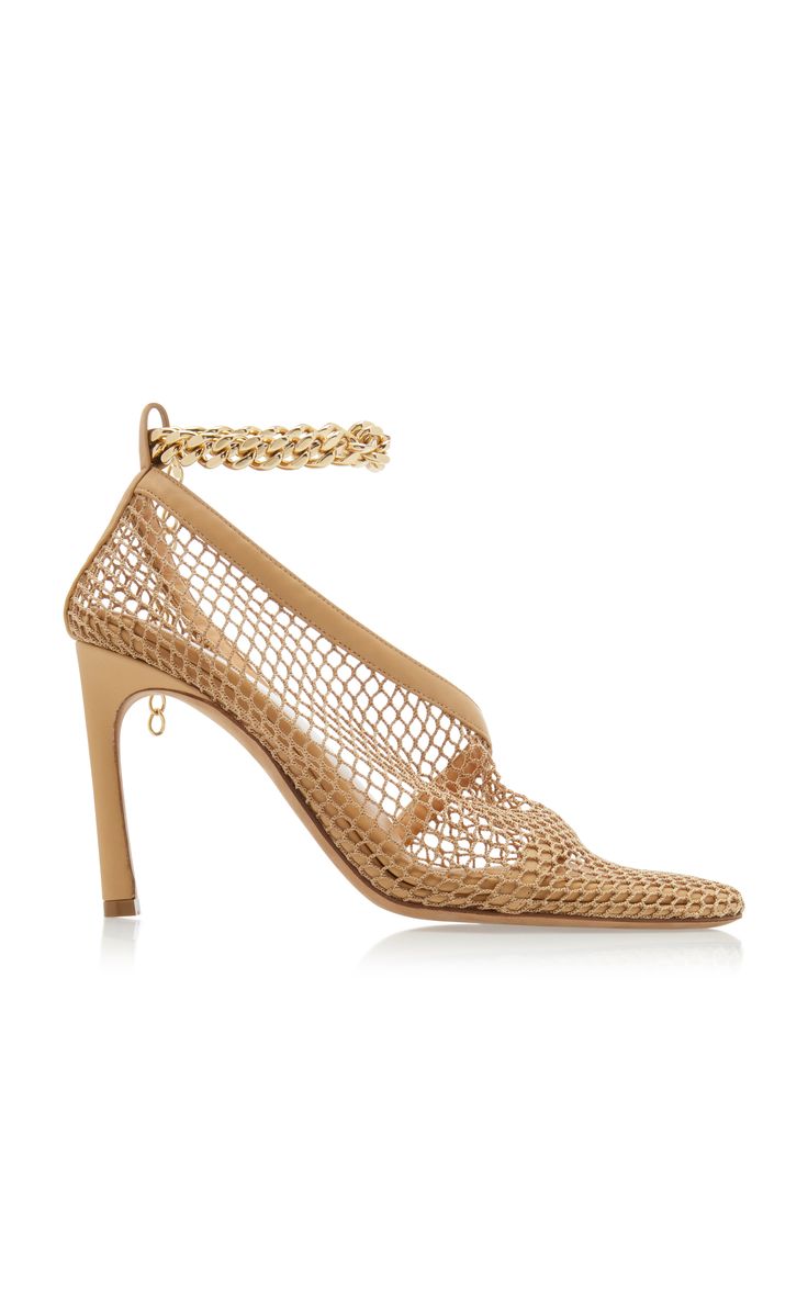 a pair of beige women's heels with a gold chain detail. the heels are made of mesh fabric and have a pointed toe. they are a stylish and elegant option for a variety of occasions.