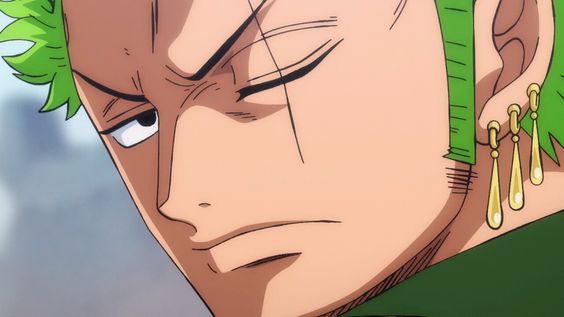 this is a closeup illustration of the character zoro roronoa from the anime one piece. he is a young man with short green hair and three gold hoop earrings. he has a scar under his left eye and is looking directly at the viewer with a serious expression.