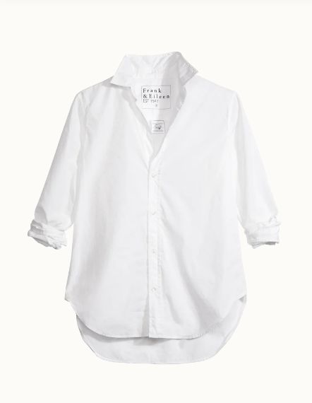 a white longsleeve button up shirt with a  collar.