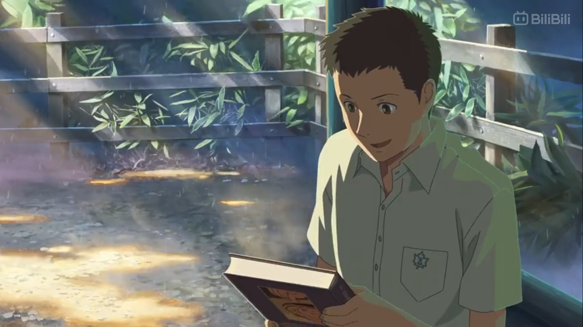 a young man in a school uniform stands on a porch bathed in dappled sunlight. he smiles gently as he reads a book, his attention fully absorbed in its pages.  the scene evokes a sense of peace and quiet contemplation. the environment suggests a school setting, with a wooden fence and lush greenery visible through the window. the animation style is reminiscent of japanese anime.