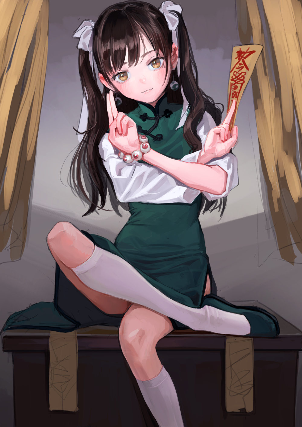 a digital anime style illustration depicts a girl in a green chinese dress, seated on a chest. the girl has brown hair styled in pigtails with white bows. she is wearing white knee socks and a bracelet with white beads. she holds up a wooden paddle with chinese writing on it.