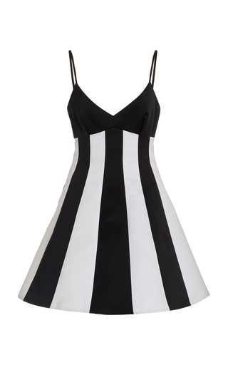 the image shows a black and white striped aline dress with spaghetti straps. the dress has a black bodice and alternating black and white vertical stripes on the skirt. the background is plain white.