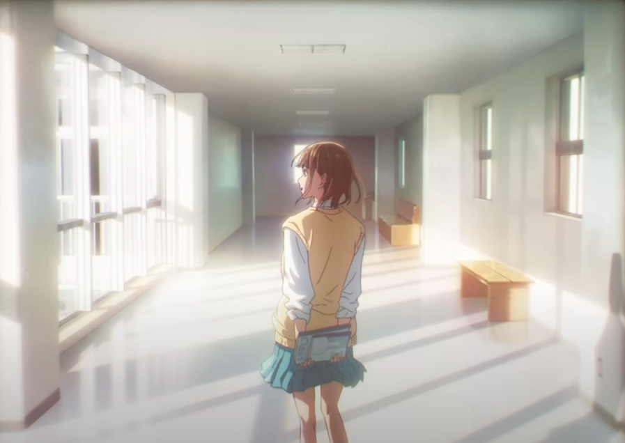 he image is a still from an anime depicting a young girl walking down a bright, sunlit hallway in a school. she has mediumlength brown hair and is wearing a school uniform that includes a teal pleated skirt and a light yellow cardigan over a white shirt. she is carrying a book or notepad behind her back. the hallway is clean and simple with large windows that let in plenty of natural light, casting shadows on the floor. the overall atmosphere is peaceful and serene.