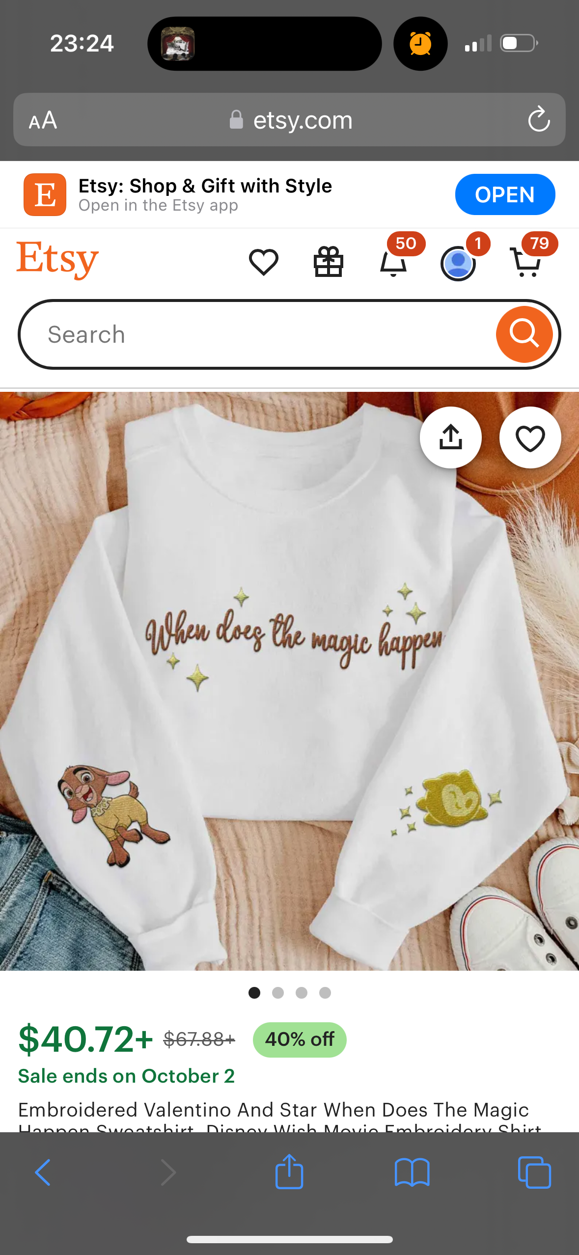 the image shows a product listing for a white embroidered sweatshirt on the etsy app. the sweatshirt features a cartoon design with characters from the disney film "lady and the tramp" and the text "when does the magic happen". it also features a sale price of $40.72, down from $67.88, with a 40% off discount. the sale is ending on october 2nd.