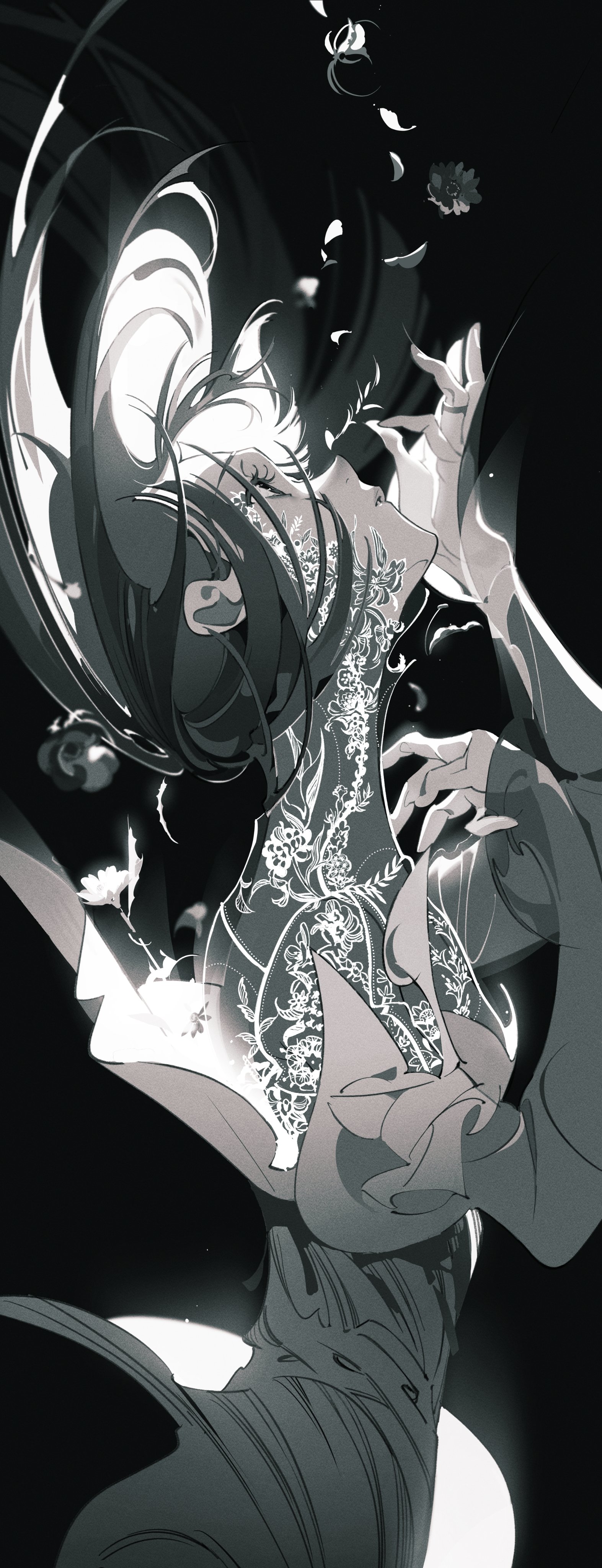 a woman with long black hair is dressed in a long, flowing dress that has a floral pattern. she is posed dramatically with her arms outstretched and her hair flowing behind her. the image is set against a dark background, and the woman's hair and dress appear to be floating in the air. the image has a dark and mysterious feel to it.