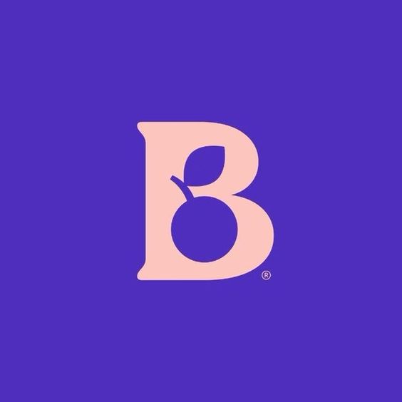 a letter b with a fruit inside of it.