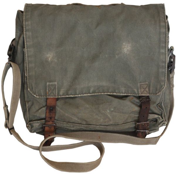 a close up of a green canvas shoulder bag with leather straps and buckles. the bag is old and worn, with a distressed look.