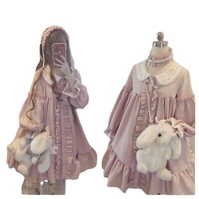 the image shows a pink lolita dress with a bunny plush on two different figures. one is a woman and the other one is a mannequin. both are shown from the front view.
