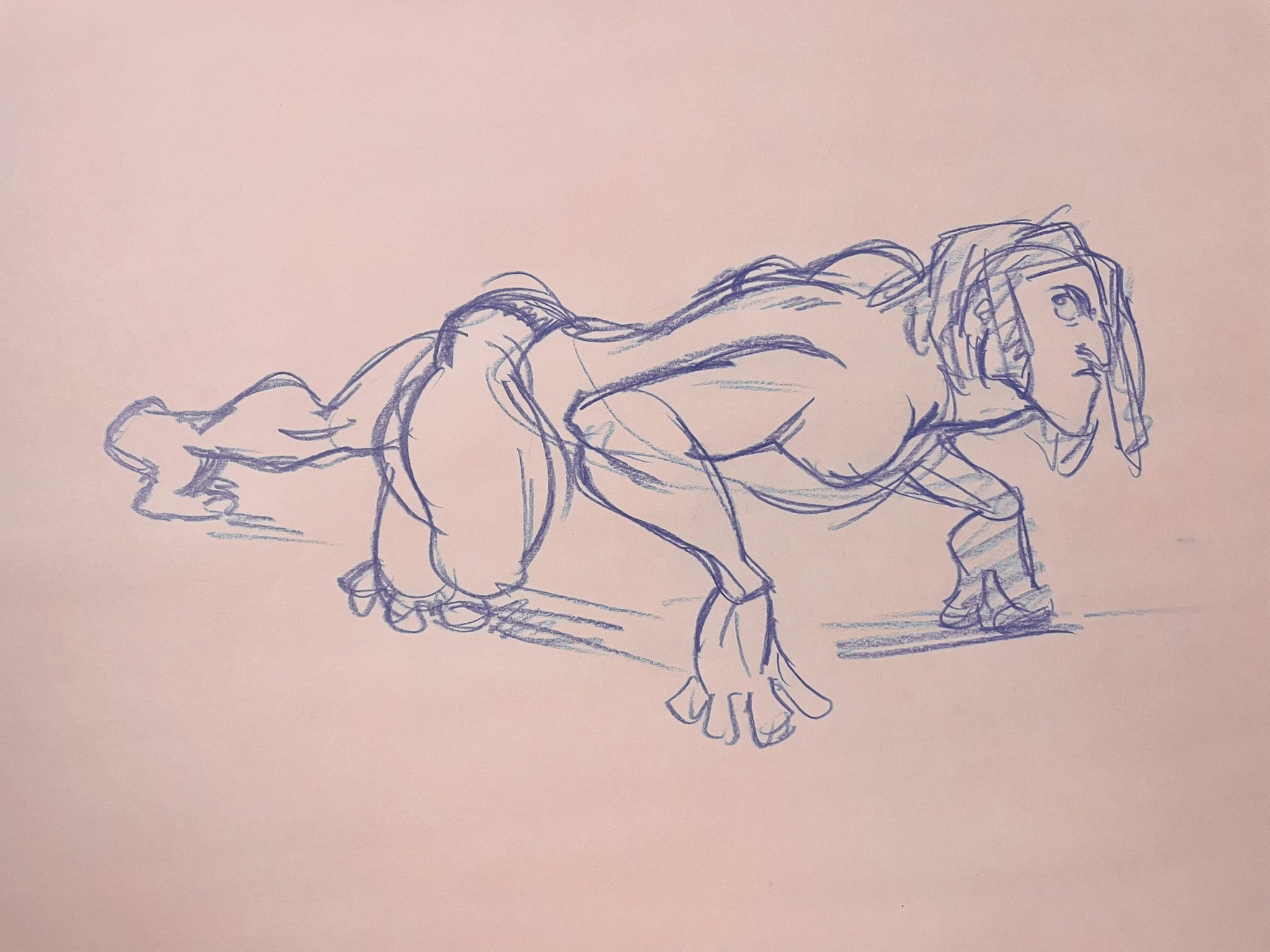 a quick sketch of a female figure in a crawling pose, drawn with blue pencil on light pink paper.