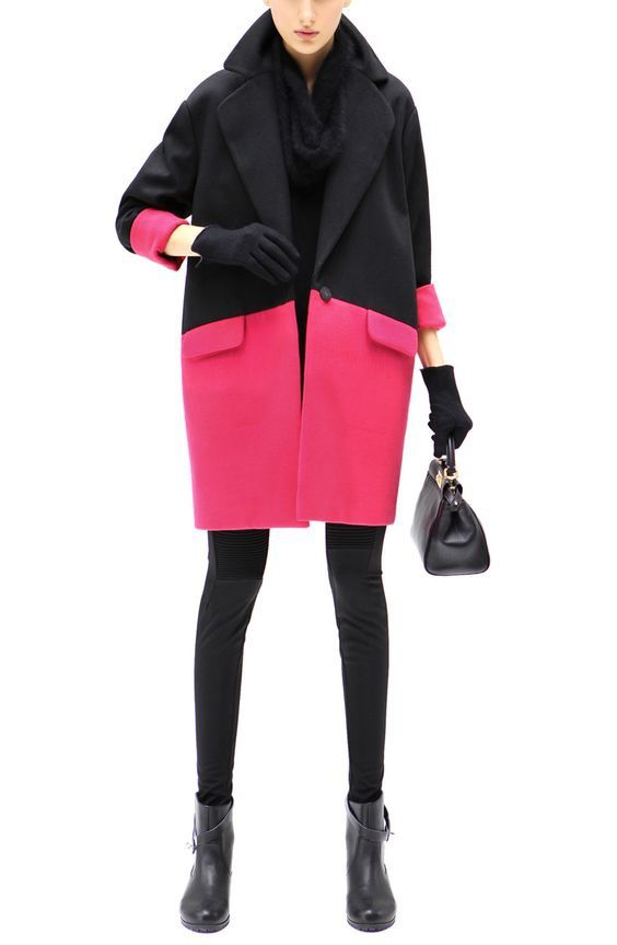 a woman is wearing a black and pink coat, black leggings, and black ankle boots, and is holding a black handbag. she is also wearing a black scarf and gloves. the background is white.