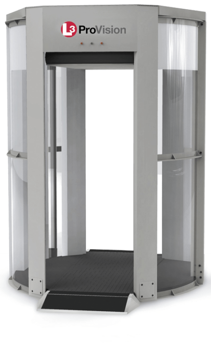 a security scanner used at airport checkpoints. the scanner is made of metal and has a circular shape with a door on one side. it is a walkthrough scanner used for security checks. the image shows a closeup of the scanner from a side view. the scanner has the logo of l3 provision on the top.