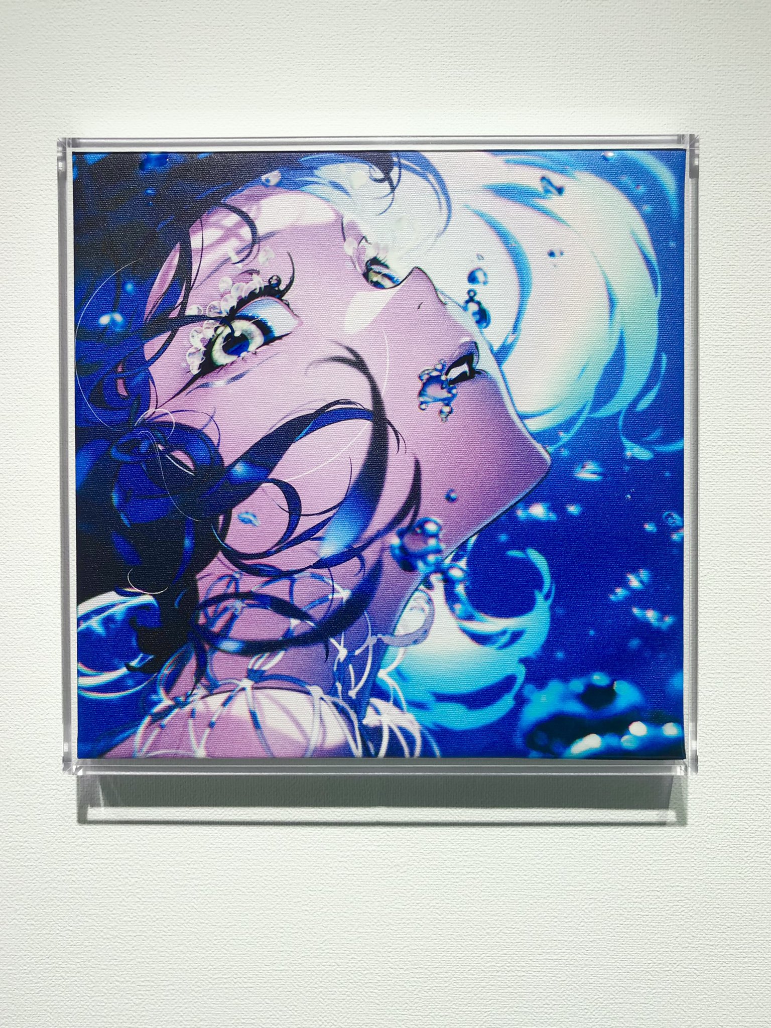 the image is a vibrant animestyle illustration of a young woman submerged in blue water. her eyes are wide and expressive, gazing directly at the viewer. bubbles float around her, and light filters through the water, creating an ethereal and dreamlike atmosphere. her expression and the surrounding water create a sense of tranquility and mystery.