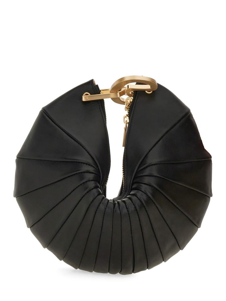 a black leather clutch bag with a gold shelllike design. the bag is pleated and has a gold zipper. it is a stylish and elegant accessory for women.