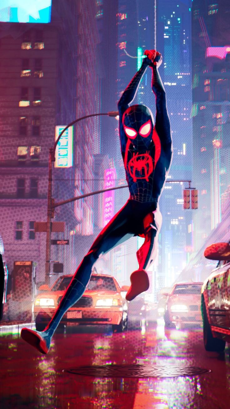 this image features miles morales, the spiderman from the animated movie spiderman: into the spiderverse. miles is in action, his red and black suit glowing in the neon lights of the city. the image captures a moment of motion and energy, as miles swings through the rainy streets, his mask reflecting the colorful cityscape around him. there is a feeling of energy and excitement in the image, as if miles is about to take on his next adventure.