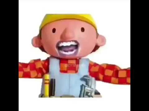 a closeup shot of a bob the builder toy with a big smile on his face. he is wearing his signature yellow hat, red and white checkered shirt, and blue overalls.