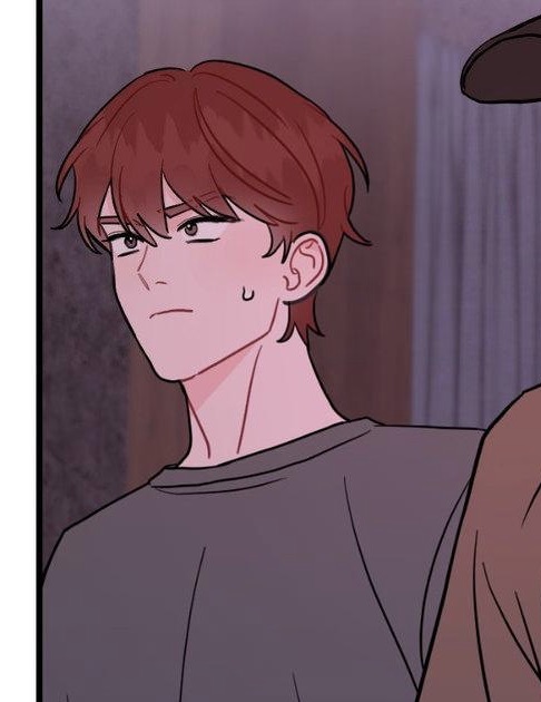 the image is a closeup illustration of a young animestyle male character. he has short, reddishbrown hair, and is wearing a simple grey tshirt. his expression is serious or neutral. the art style suggests a manga or webtoon aesthetic, possibly korean manhwa given the character design. a portion of another person, possibly wearing a baseball cap, is visible in the background to the right, suggesting a scene from a larger narrative.  the overall tone is soft and slightly muted in color.
