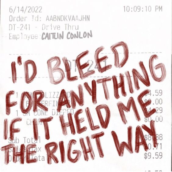 the image shows a crumpled white fastfood receipt with the words "i'd bleed for anything if it held me the right way" written across it in a flowing, red cursive script. some of the original receipt information, like the date, order id, employee name, and drivethru designation, are still visible. the phrase suggests a deep longing and willingness to sacrifice for love, even if it's unrequited or unhealthy.