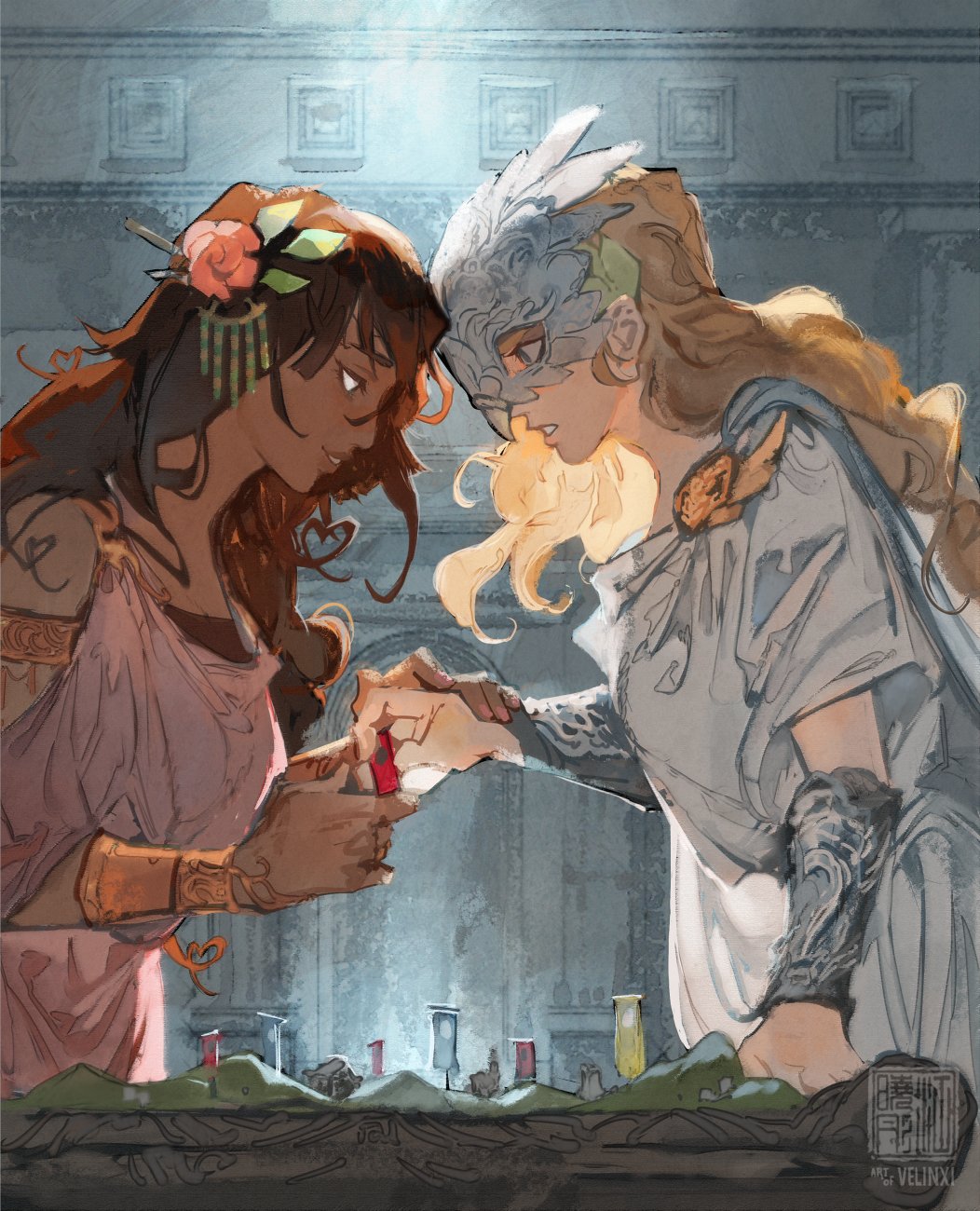 two women are focused on a game played on a table. one is wearing a mask and armor while the other is wearing a wreath of leaves and flowers.
